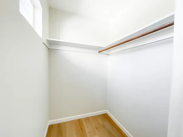 a view of a room with racks on the wall