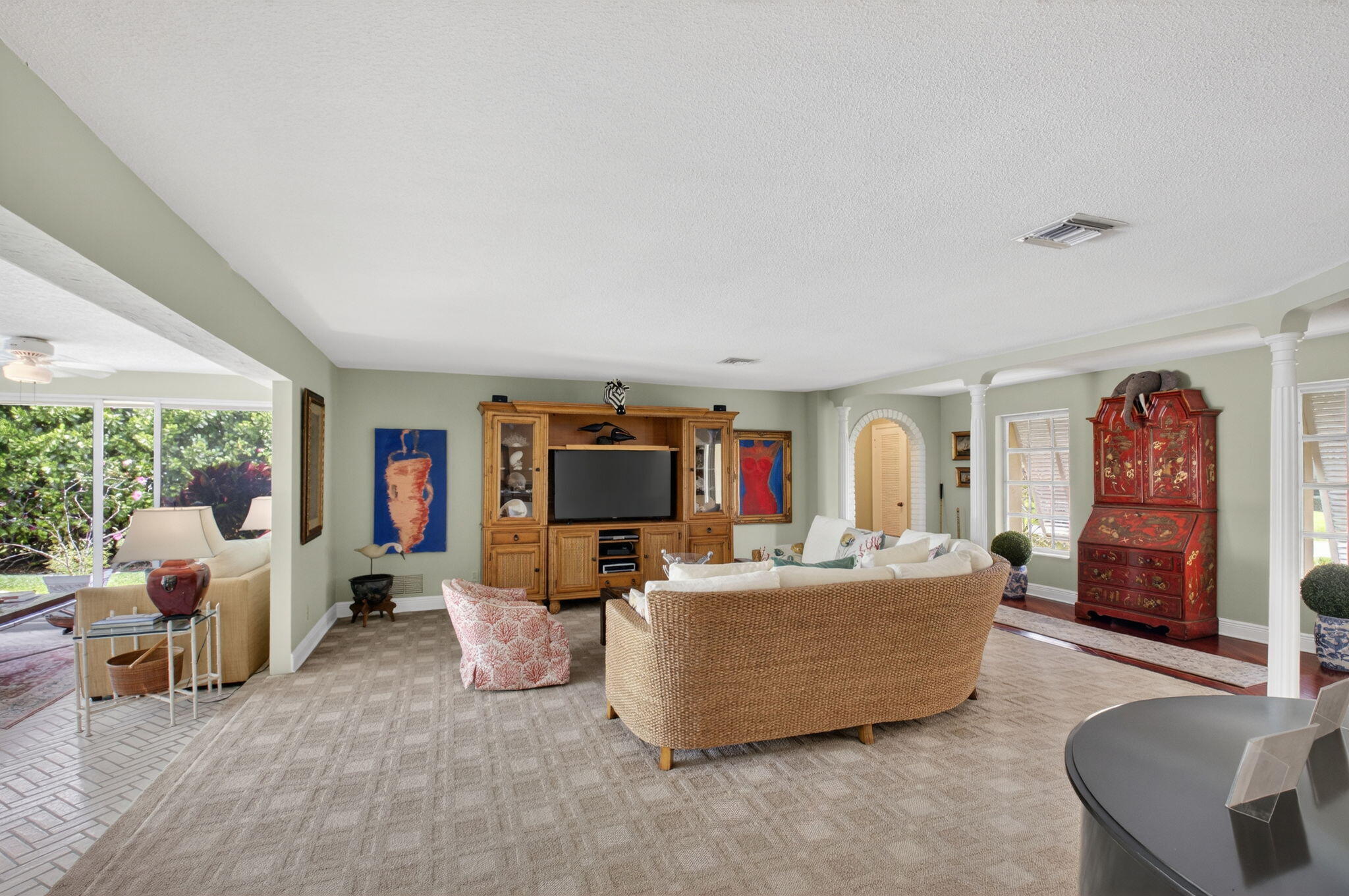 30 Spanish River Drive Ocean Ridge, FL 33435 - Photo 15 of 68 a living room with furniture and a flat screen tv
