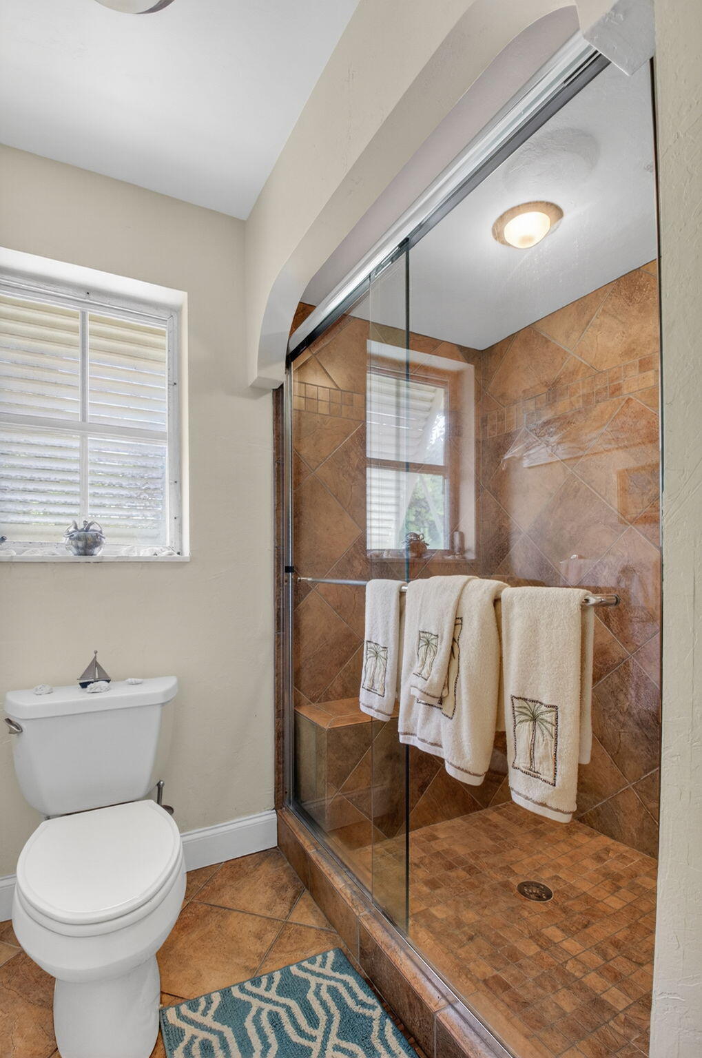30 Spanish River Drive Ocean Ridge, FL 33435 - Photo 22 of 68 a bathroom with a toilet a sink and a window