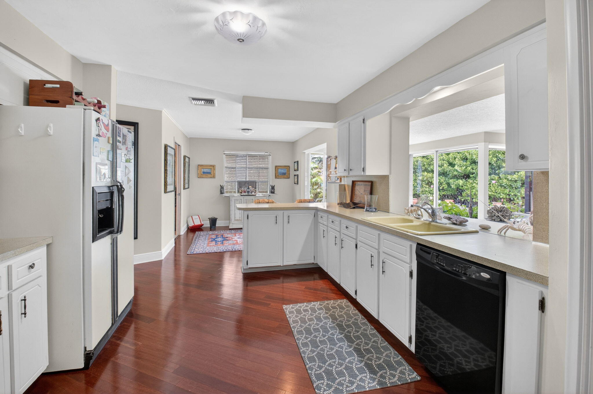 30 Spanish River Drive Ocean Ridge, FL 33435 - Photo 34 of 68 a large white kitchen with a window