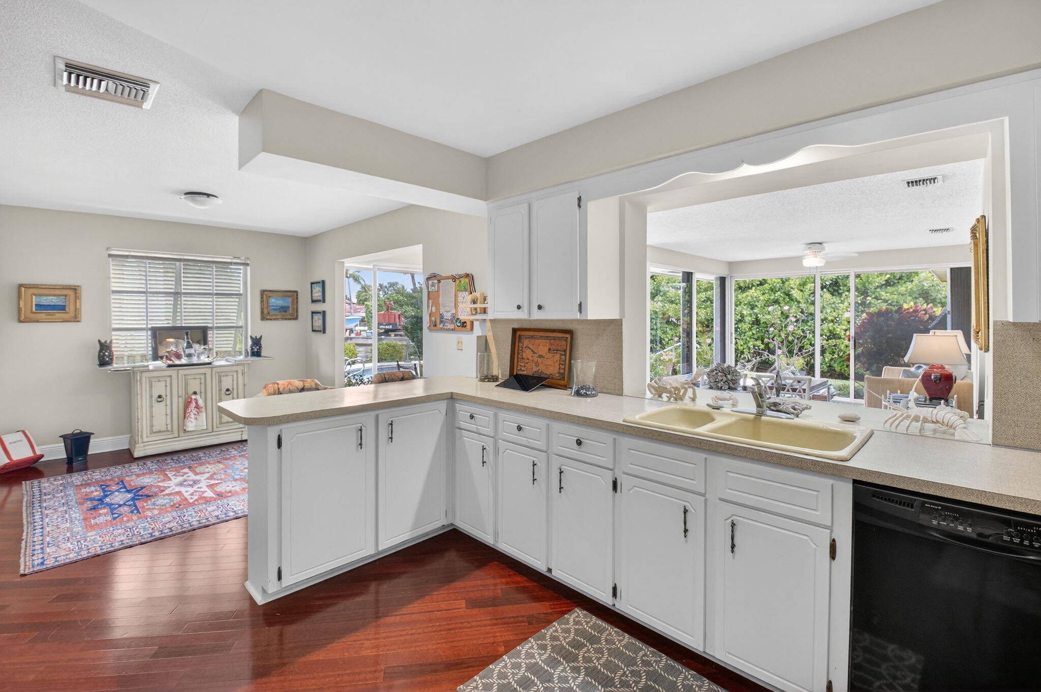 30 Spanish River Drive Ocean Ridge, FL 33435 - Photo 36 of 68 a kitchen with a sink stove and cabinets