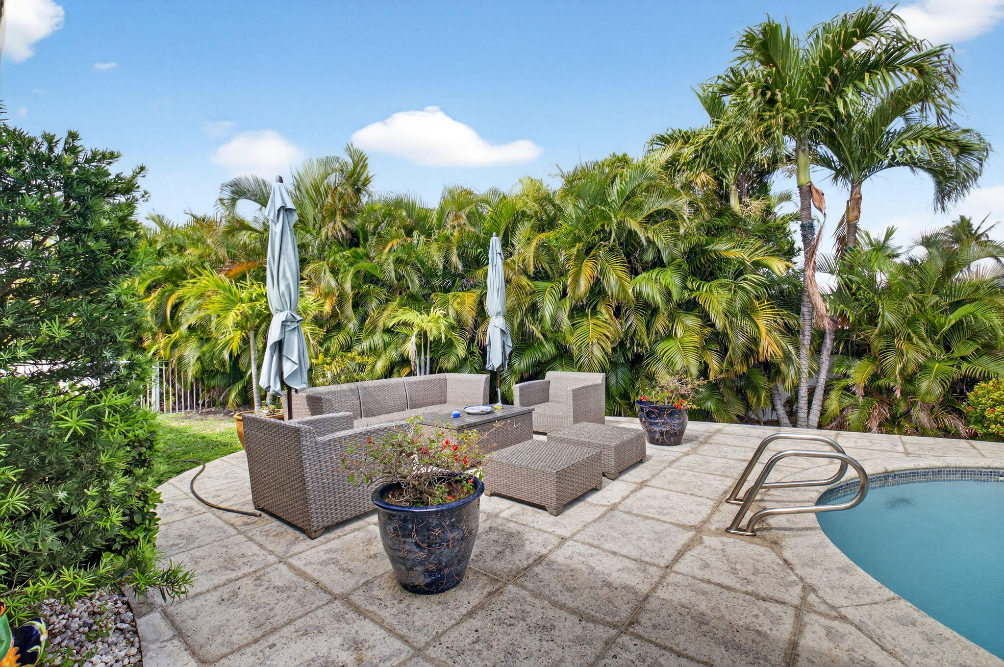 30 Spanish River Drive Ocean Ridge, FL 33435 - Photo 41 of 68 a view of a backyard with sitting area