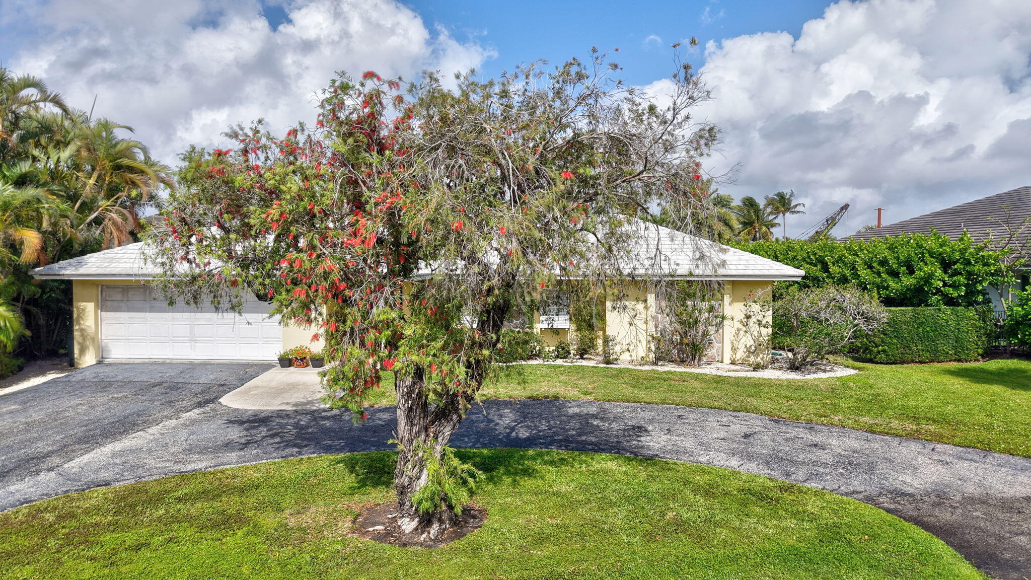 30 Spanish River Drive Ocean Ridge, FL 33435 - Photo 53 of 68 a front view of a house with a yard