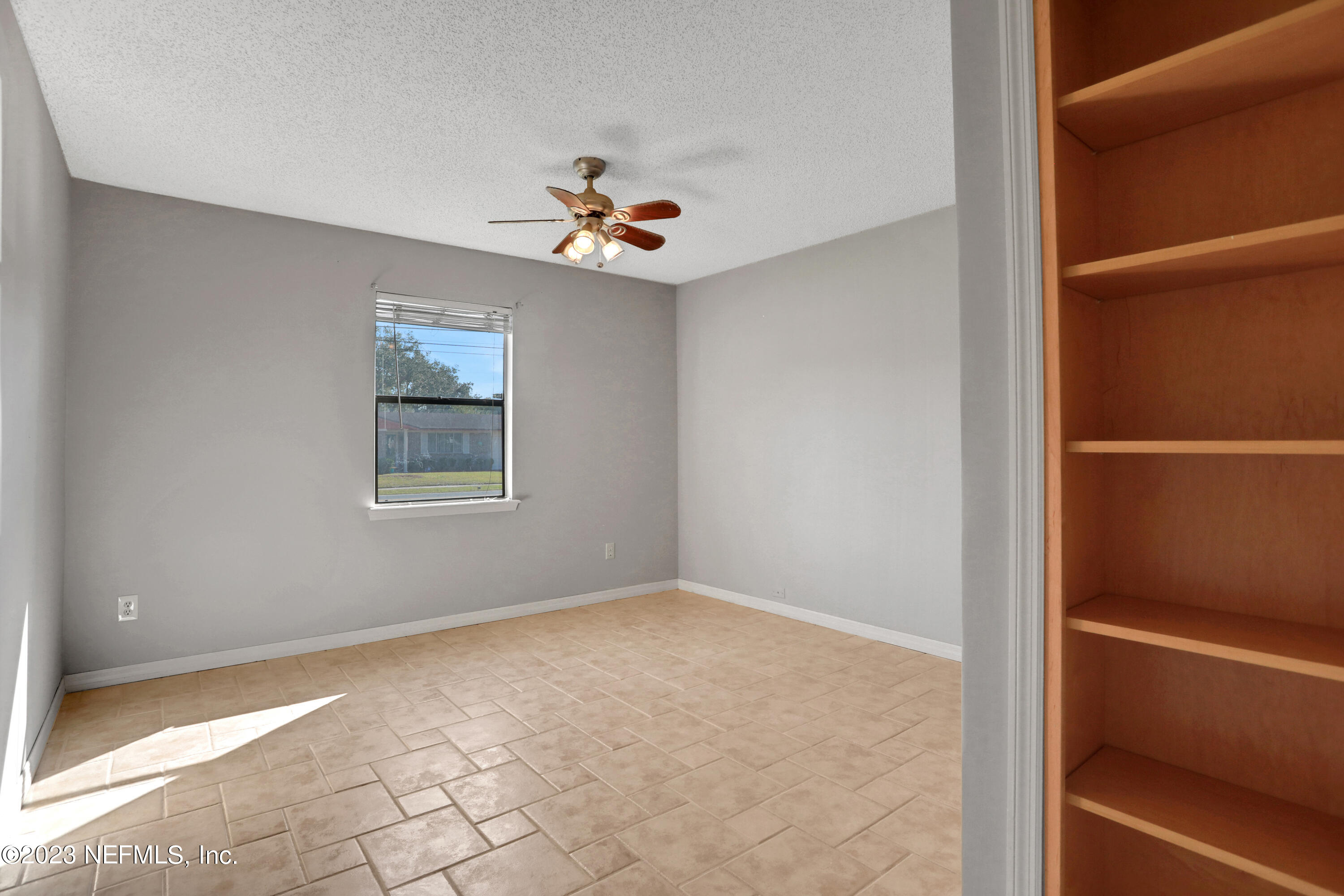 3826 Eunice Road Jacksonville, FL 32250 - Photo 11 of 45 a view of an empty room with a window
