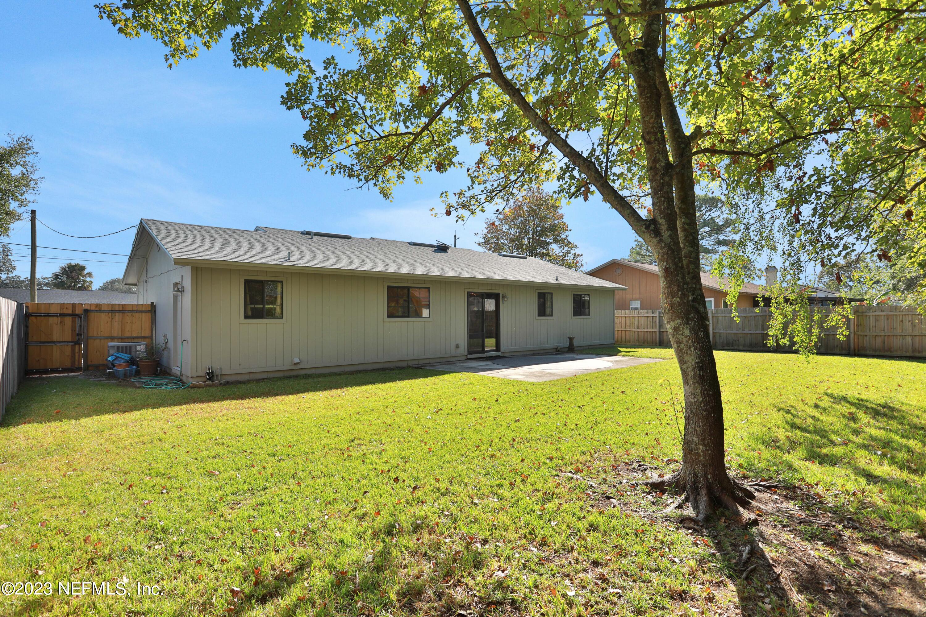 3826 Eunice Road Jacksonville, FL 32250 - Photo 34 of 45 a front view of house with yard and green space