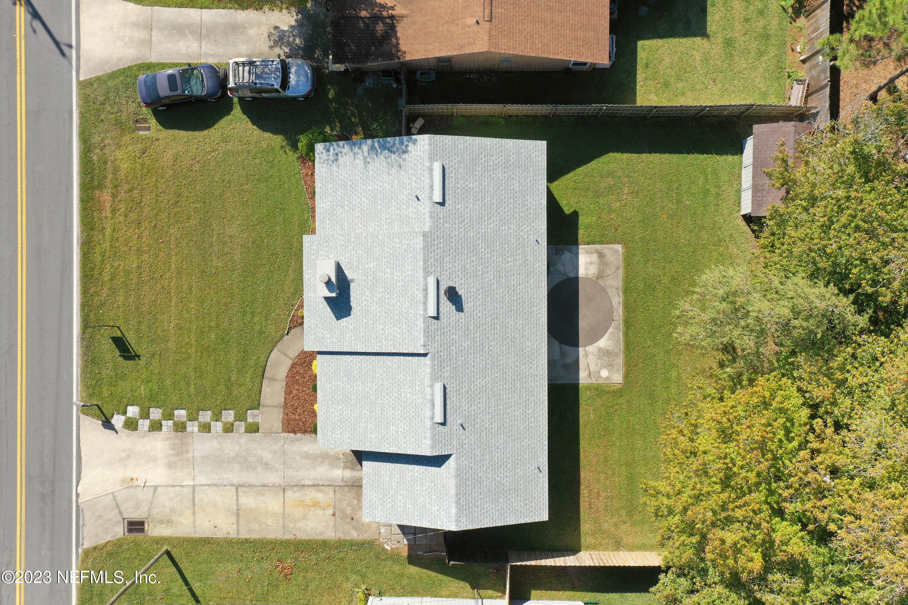 3826 Eunice Road Jacksonville, FL 32250 - Photo 37 of 45 an aerial view of a residential houses with yard