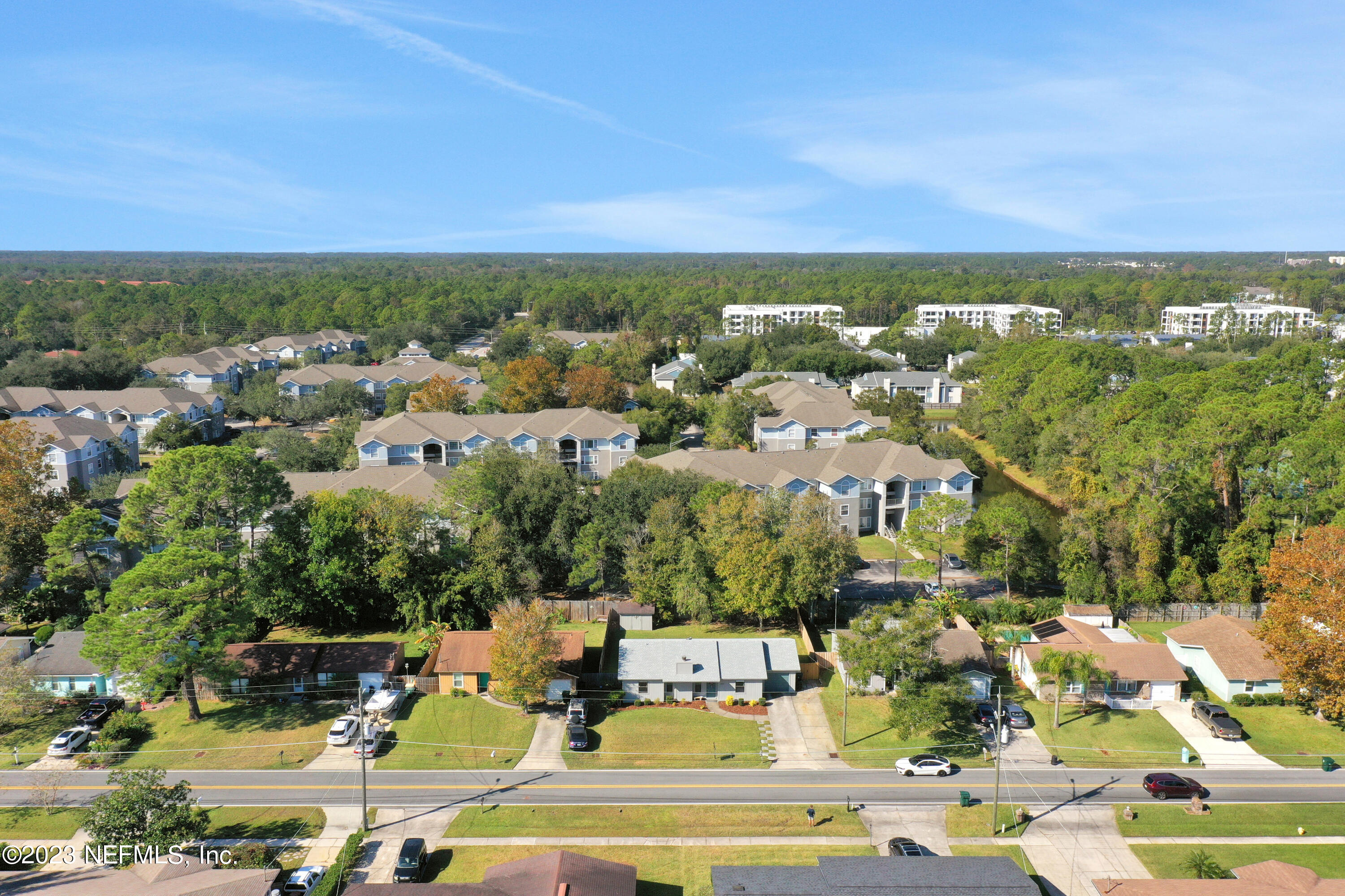 3826 Eunice Road Jacksonville, FL 32250 - Photo 44 of 45 an aerial view of residential houses with outdoor space