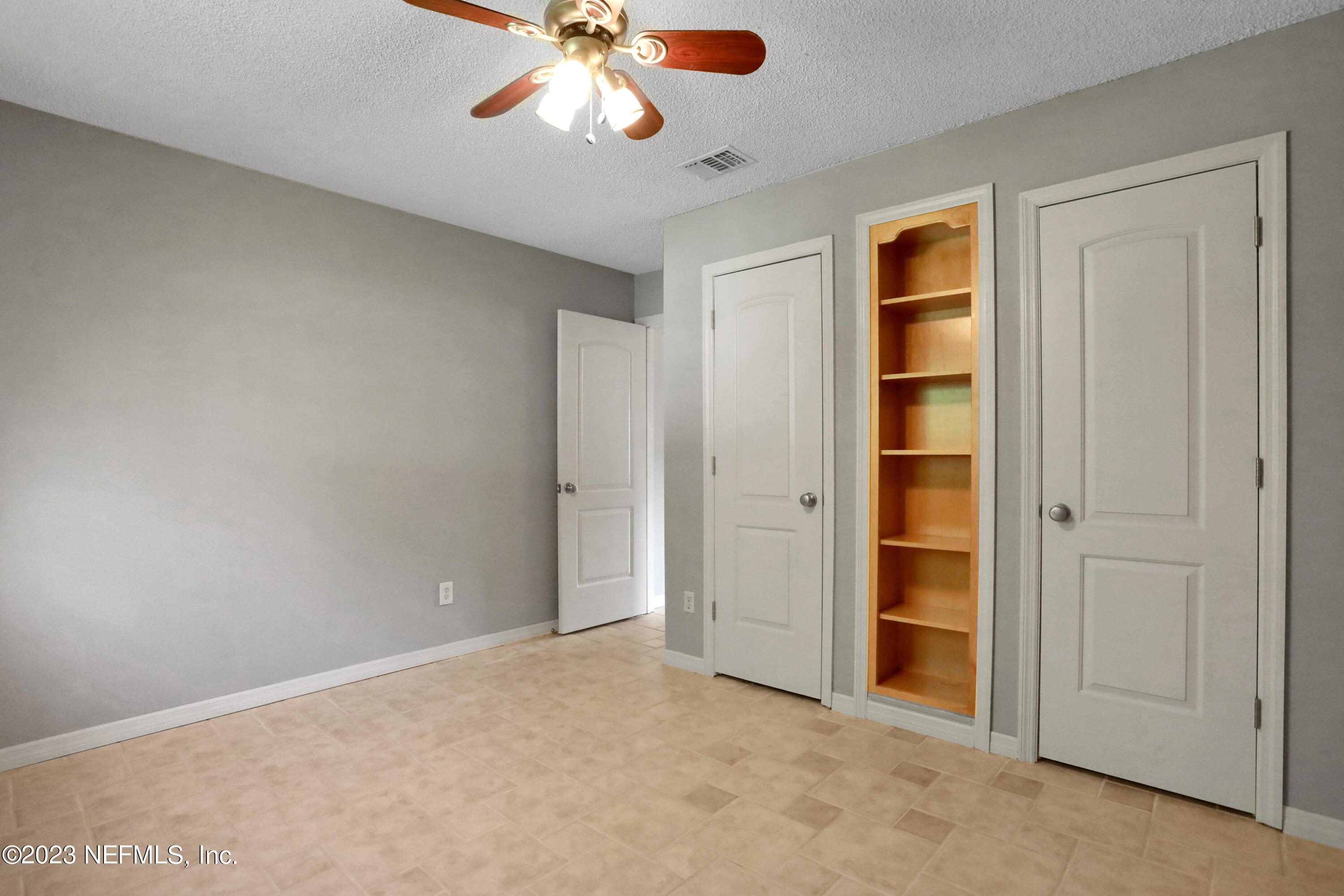 3826 Eunice Road Jacksonville, FL 32250 - Photo 10 of 45 an empty room with closet area