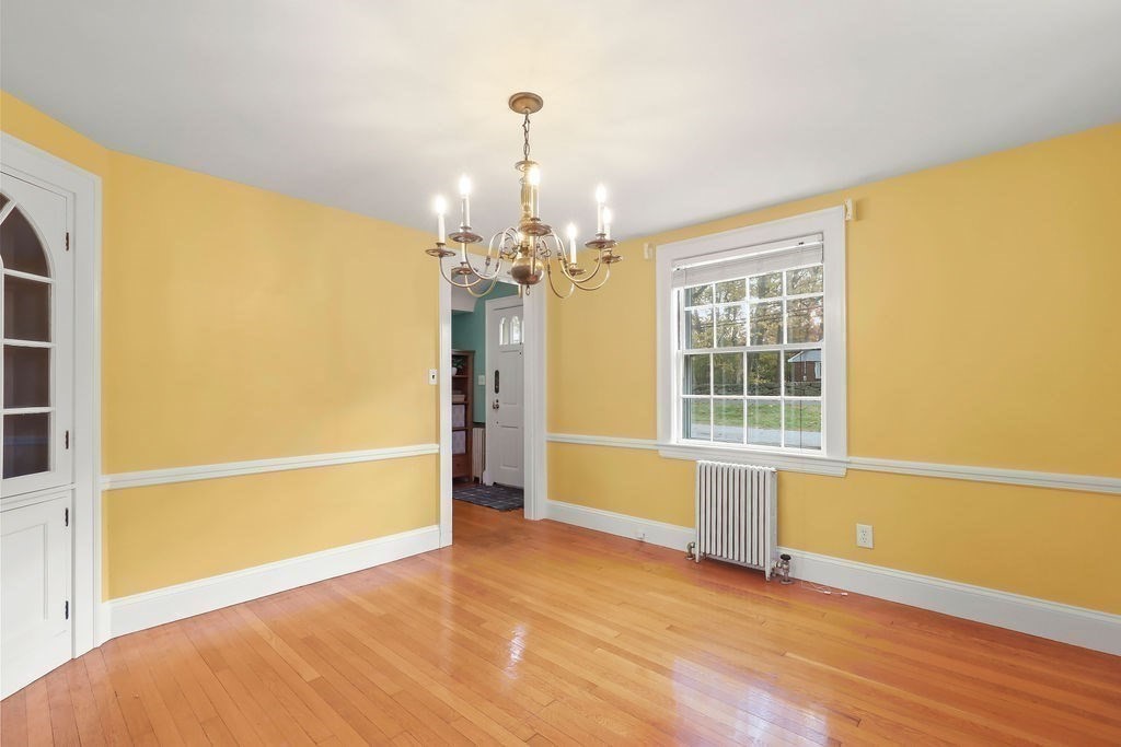 1297 Old Worcester Road Framingham, MA 01701 - Photo 13 of 41 a view of an empty room with a window