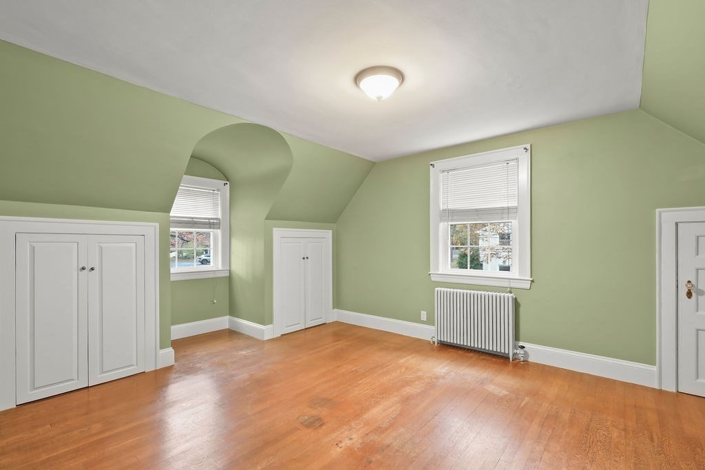 1297 Old Worcester Road Framingham, MA 01701 - Photo 24 of 41 a view of livingroom with window and entryway to ceiling window