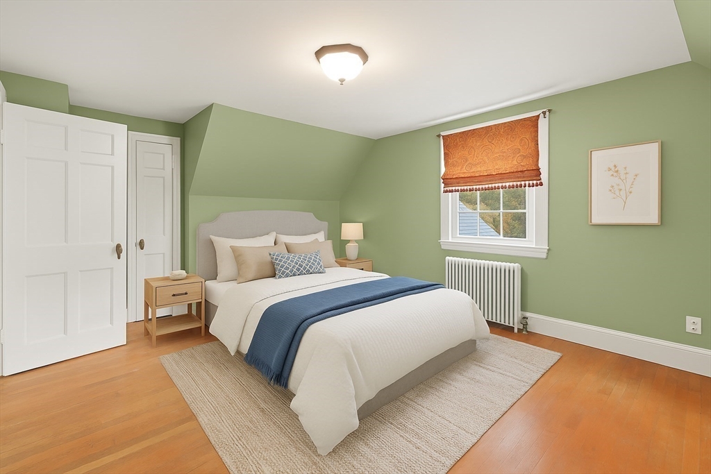 1297 Old Worcester Road Framingham, MA 01701 - Photo 27 of 41 a bedroom with a bed and a window