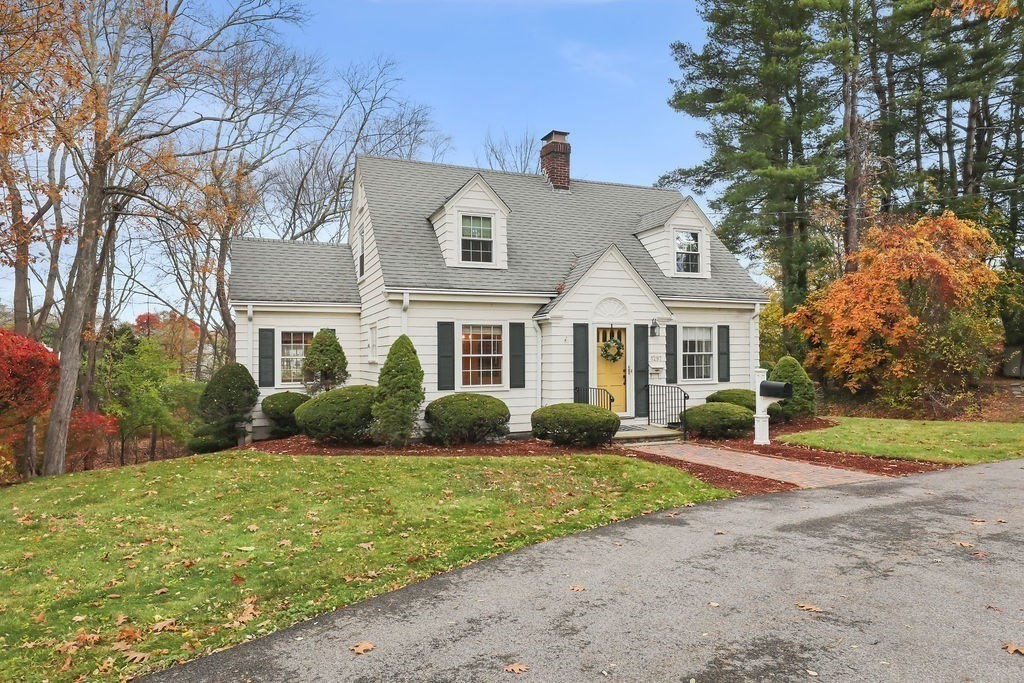 1297 Old Worcester Road Framingham, MA 01701 - Photo 3 of 41 a front view of a house with a yard and porch