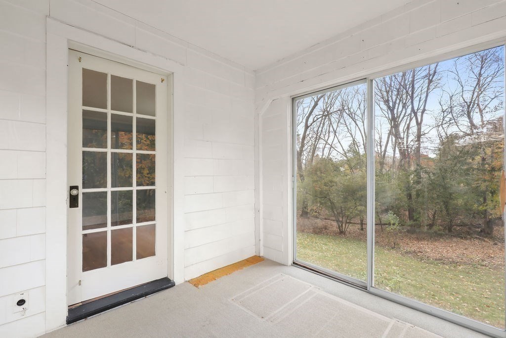 1297 Old Worcester Road Framingham, MA 01701 - Photo 32 of 41 a view of an empty room with a window