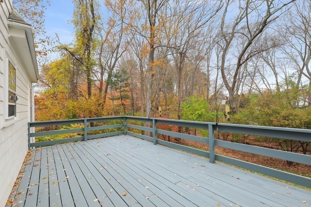 1297 Old Worcester Road Framingham, MA 01701 - Photo 33 of 41 a view of outdoor space with deck and large trees