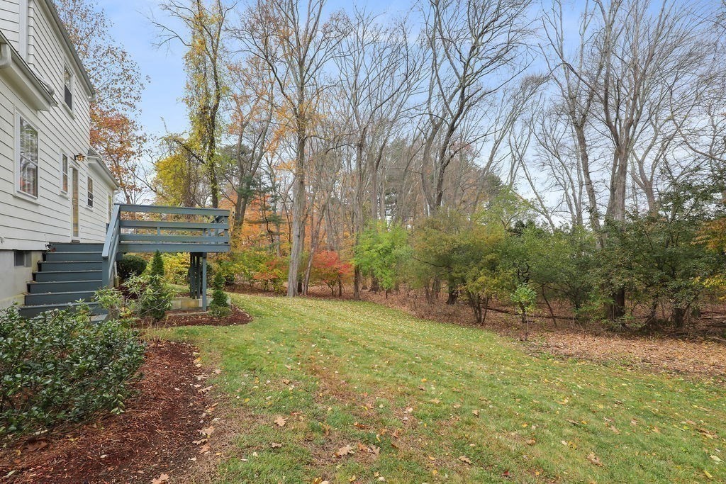 1297 Old Worcester Road Framingham, MA 01701 - Photo 35 of 41 a view of a backyard with large trees