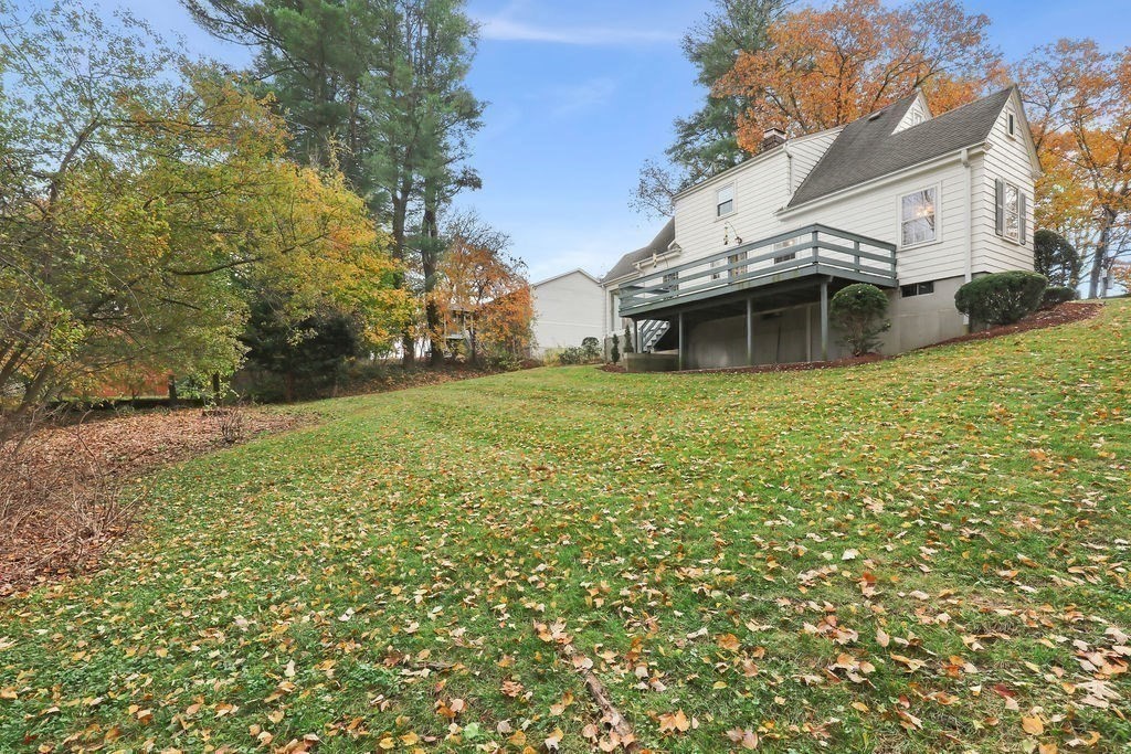 1297 Old Worcester Road Framingham, MA 01701 - Photo 38 of 41 a view of a house with a yard