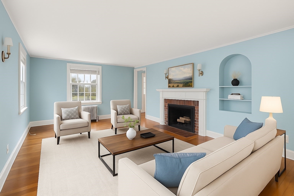 1297 Old Worcester Road Framingham, MA 01701 - Photo 6 of 41 a living room with furniture and a fireplace
