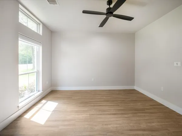 a view of a garden with a fountain