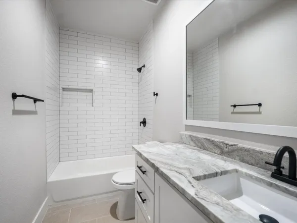 a house with garden in front of it