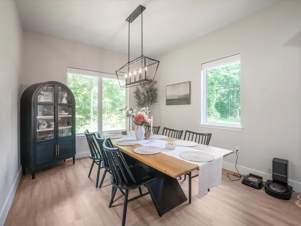 a spacious bedroom with a bed and window