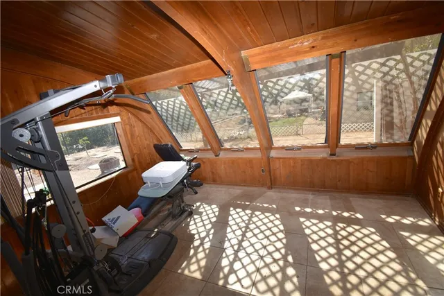 a view of a porch with furniture