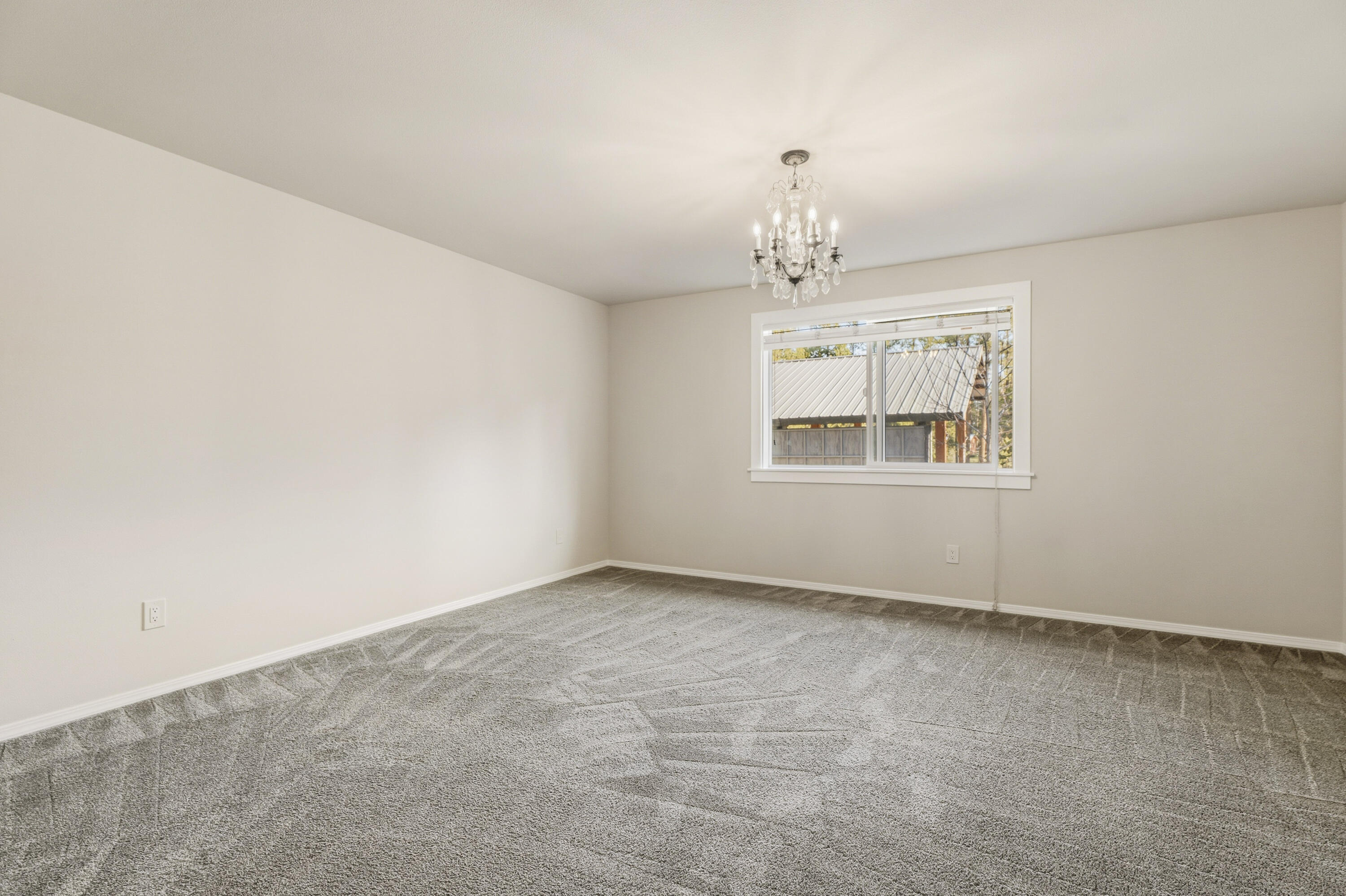 16050 Dick Road La Pine, OR 97739 - Photo 23 of 59 a view of an empty room with a window