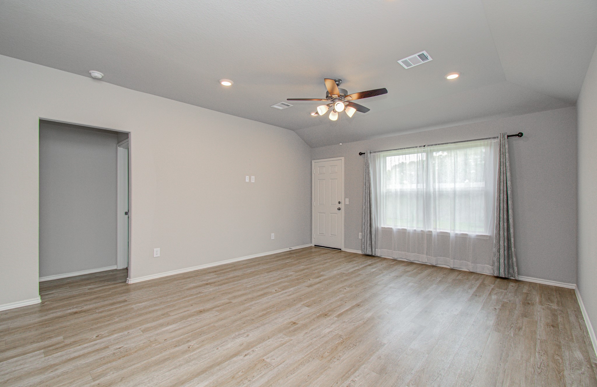 2030 Brixham Bluff Lane Spring, TX 77373 - Photo 9 of 29 spacious living area overlooking the backyard