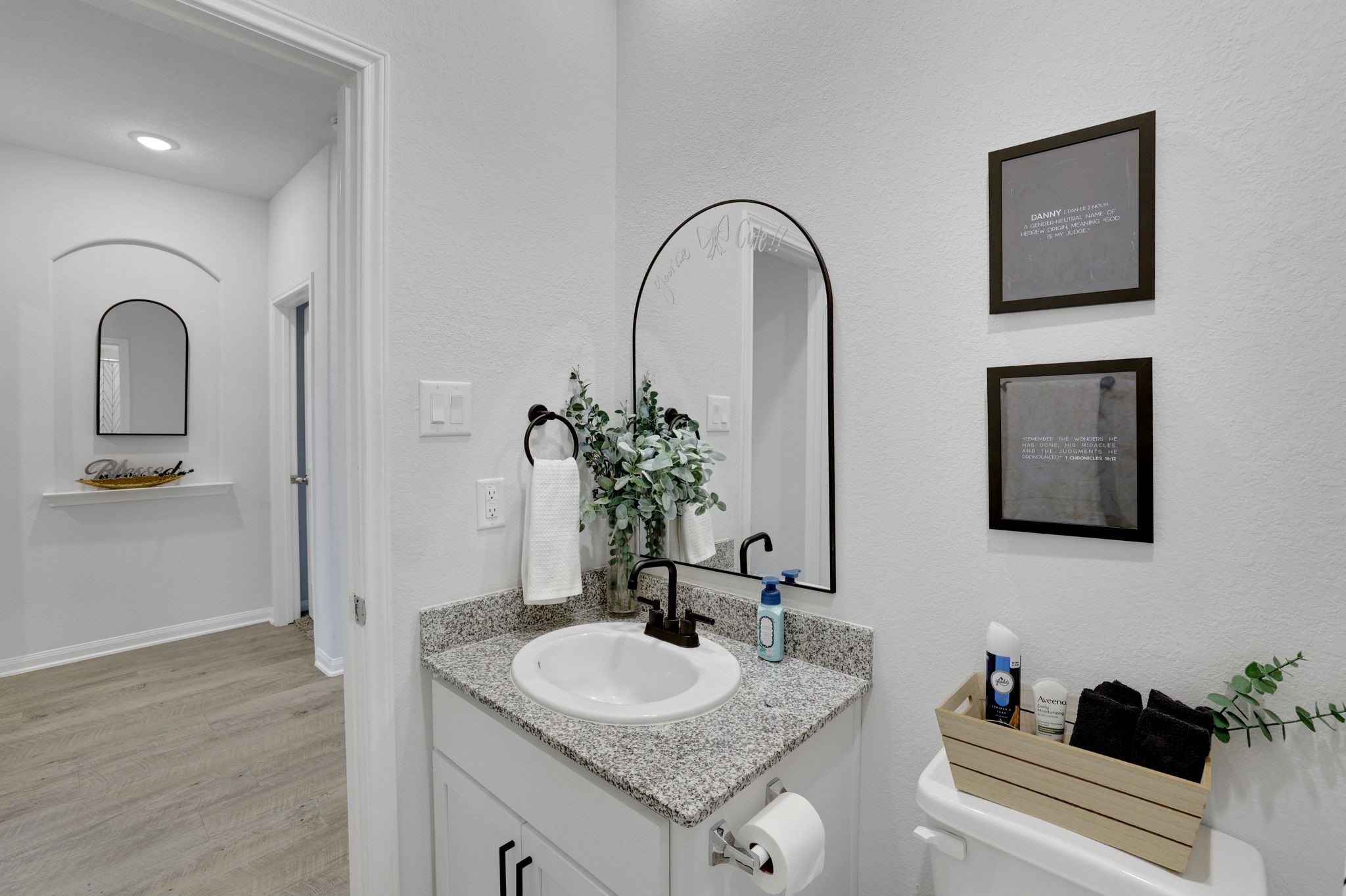 11208 Danny Lane Willis, TX 77318 - Photo 19 of 43 a bathroom with a granite countertop sink and a mirror