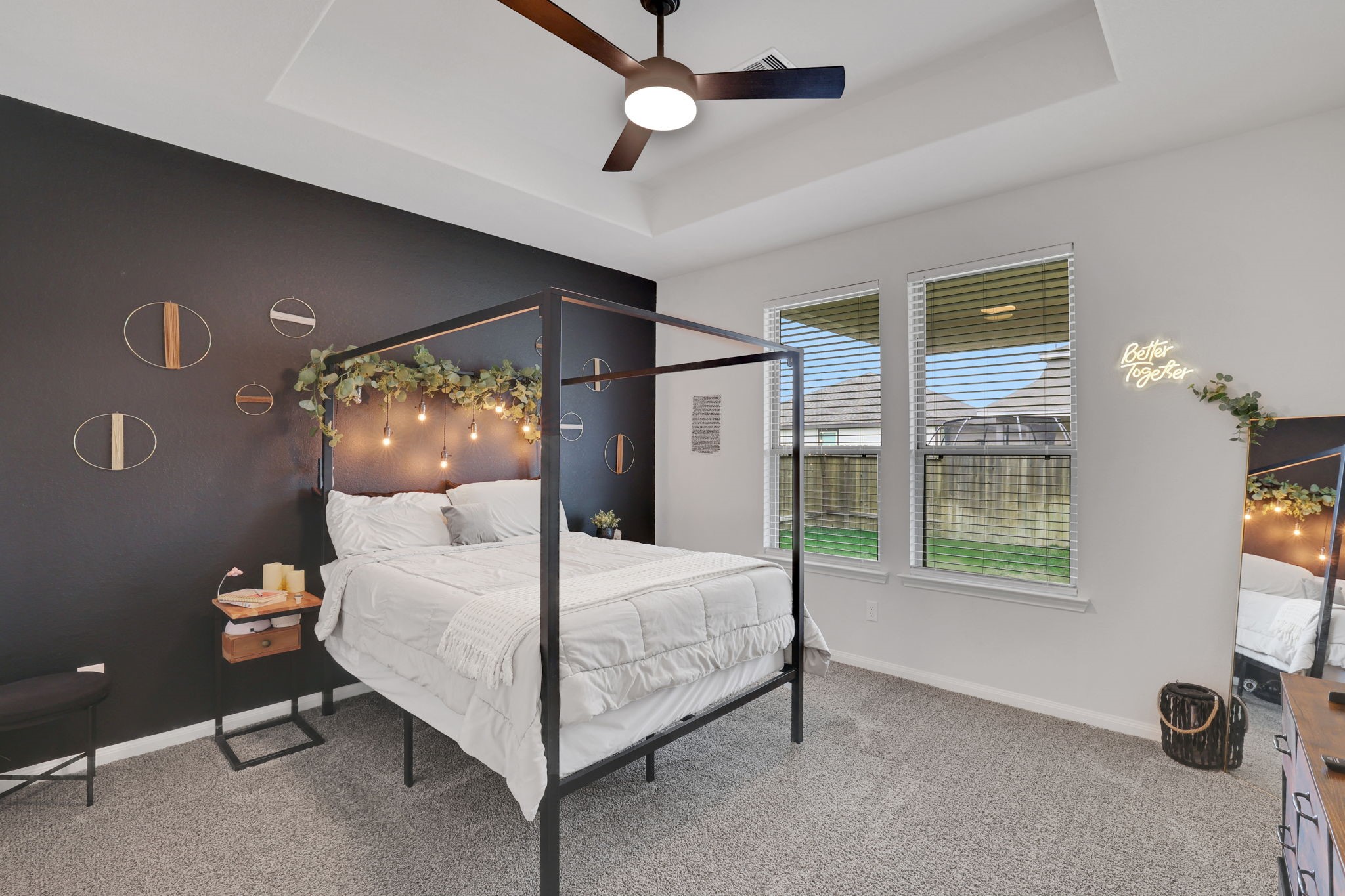 11208 Danny Lane Willis, TX 77318 - Photo 20 of 43 a bedroom with a bed and a large window