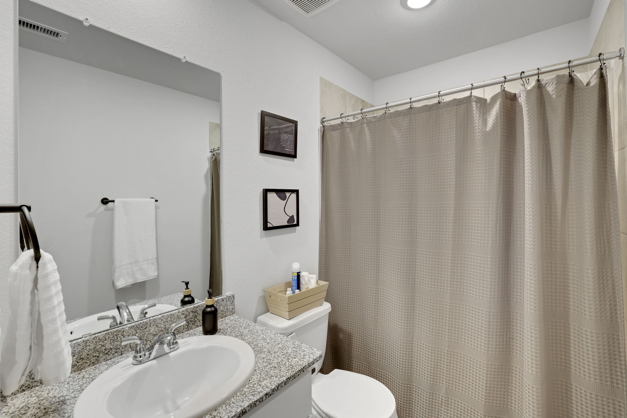 11208 Danny Lane Willis, TX 77318 - Photo 34 of 43 a bathroom with a sink and a mirror