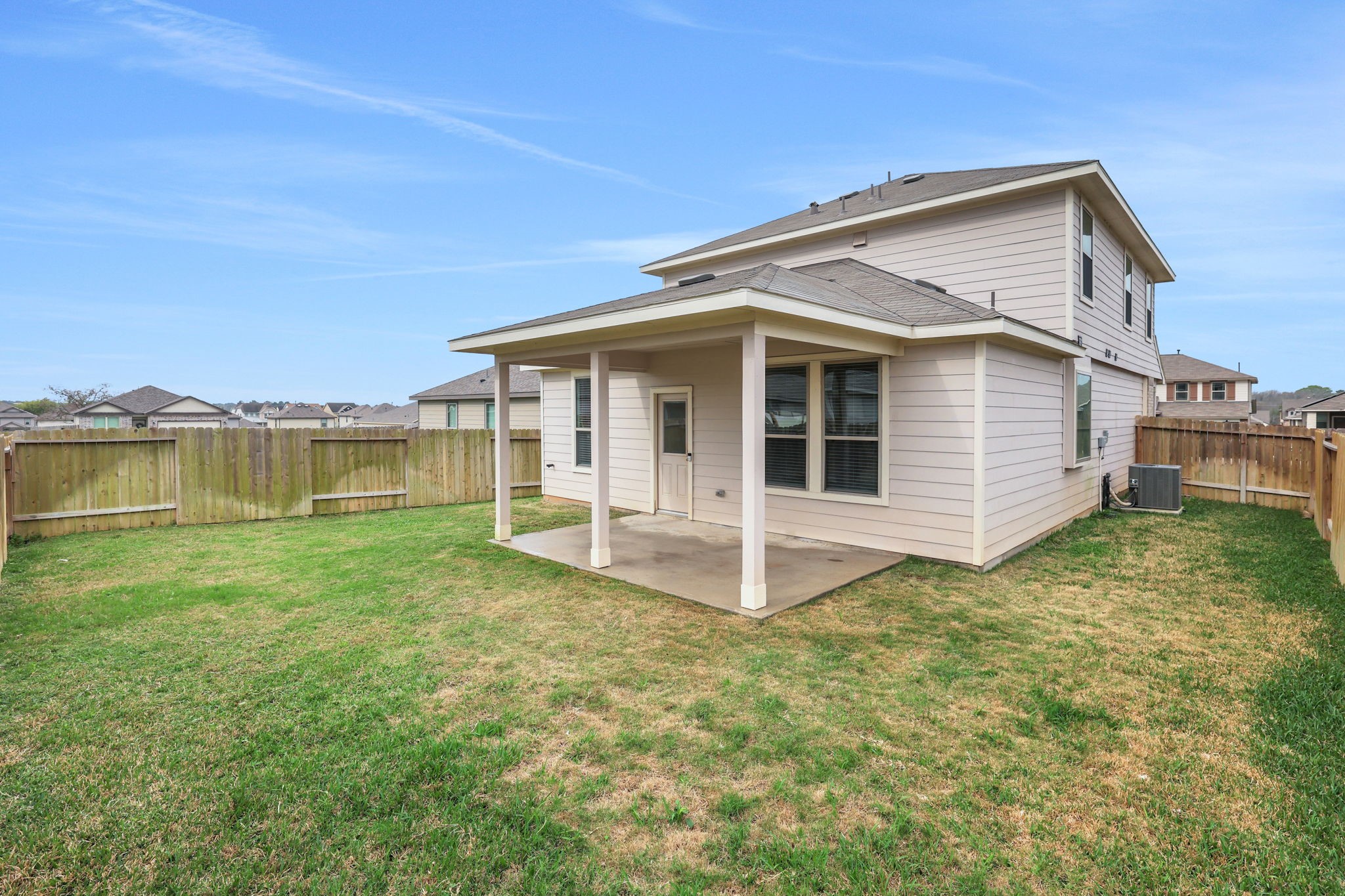 11208 Danny Lane Willis, TX 77318 - Photo 39 of 43 a view of a house with a yard and sitting area