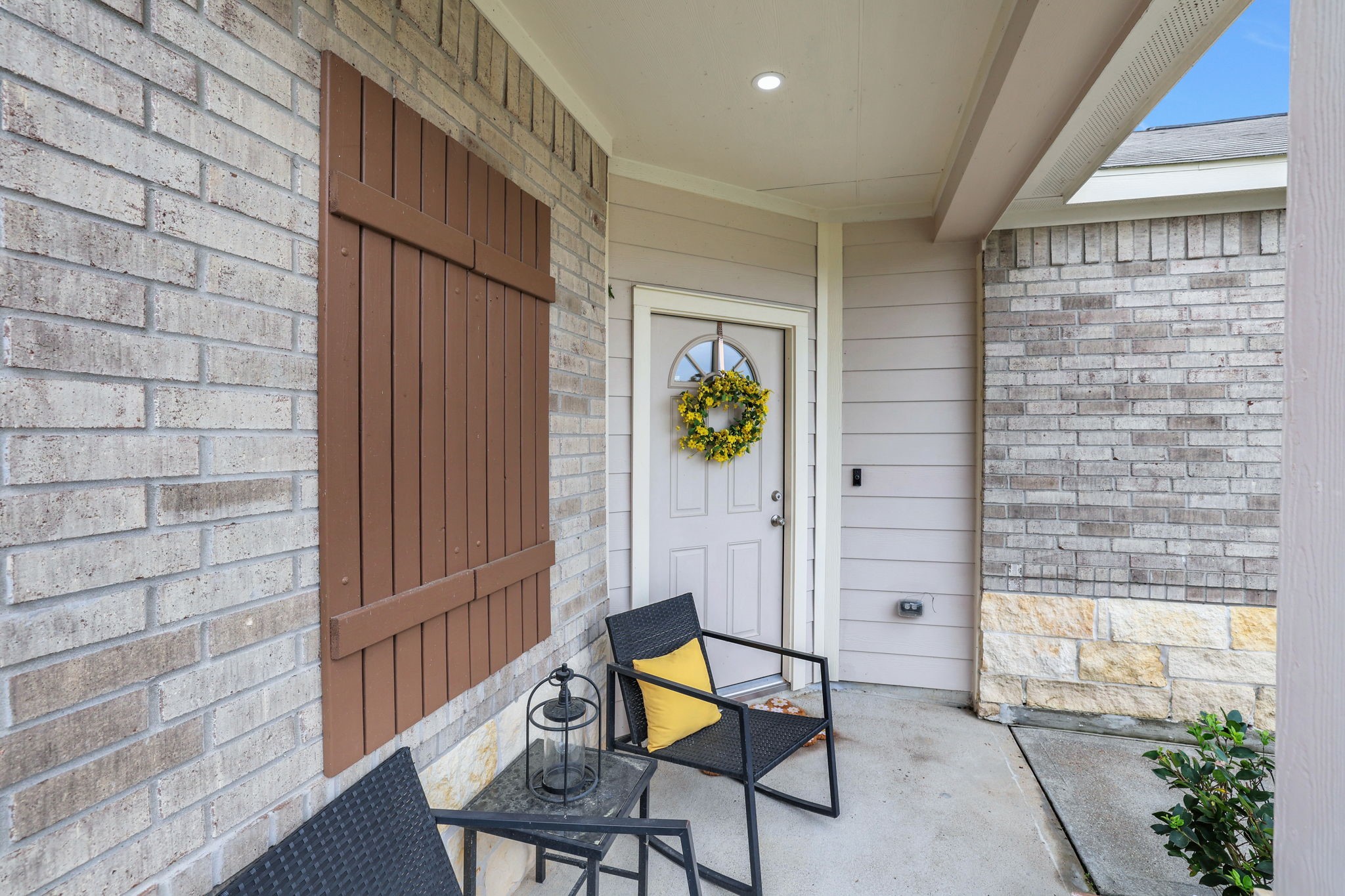 11208 Danny Lane Willis, TX 77318 - Photo 41 of 43 a view of an entryway with wooden floor and garden