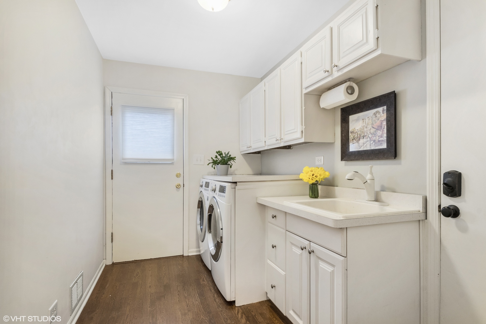 4100 Chester Drive Glenview, IL 60026 - Photo 14 of 34 a utility room with cabinets washer and dryer