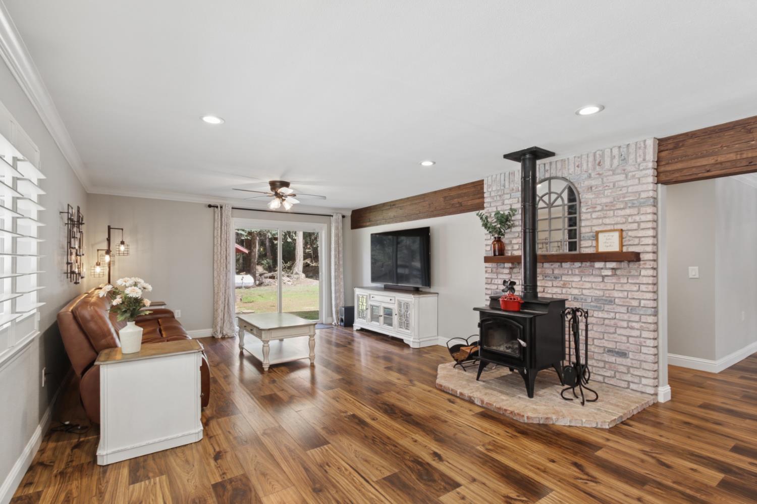 33837 Nary Red Road Alta, CA 95701 - Photo 26 of 74 a living room with furniture flat screen tv and wooden floor