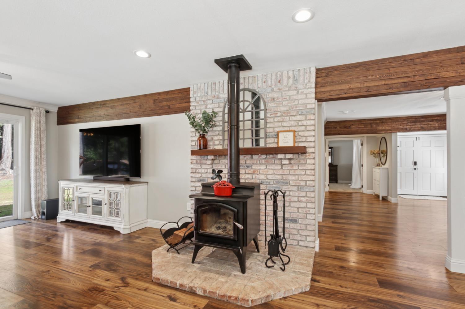 33837 Nary Red Road Alta, CA 95701 - Photo 28 of 74 a living room with fireplace furniture and a flat screen tv