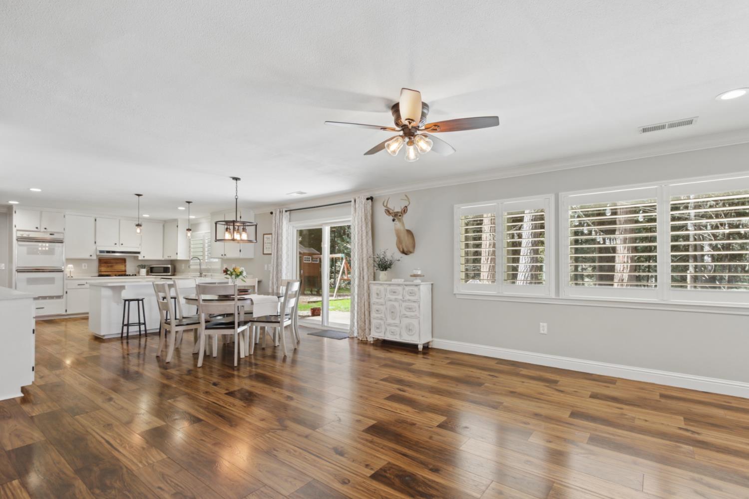 33837 Nary Red Road Alta, CA 95701 - Photo 31 of 74 a view of a dining room with furniture window and wooden floor