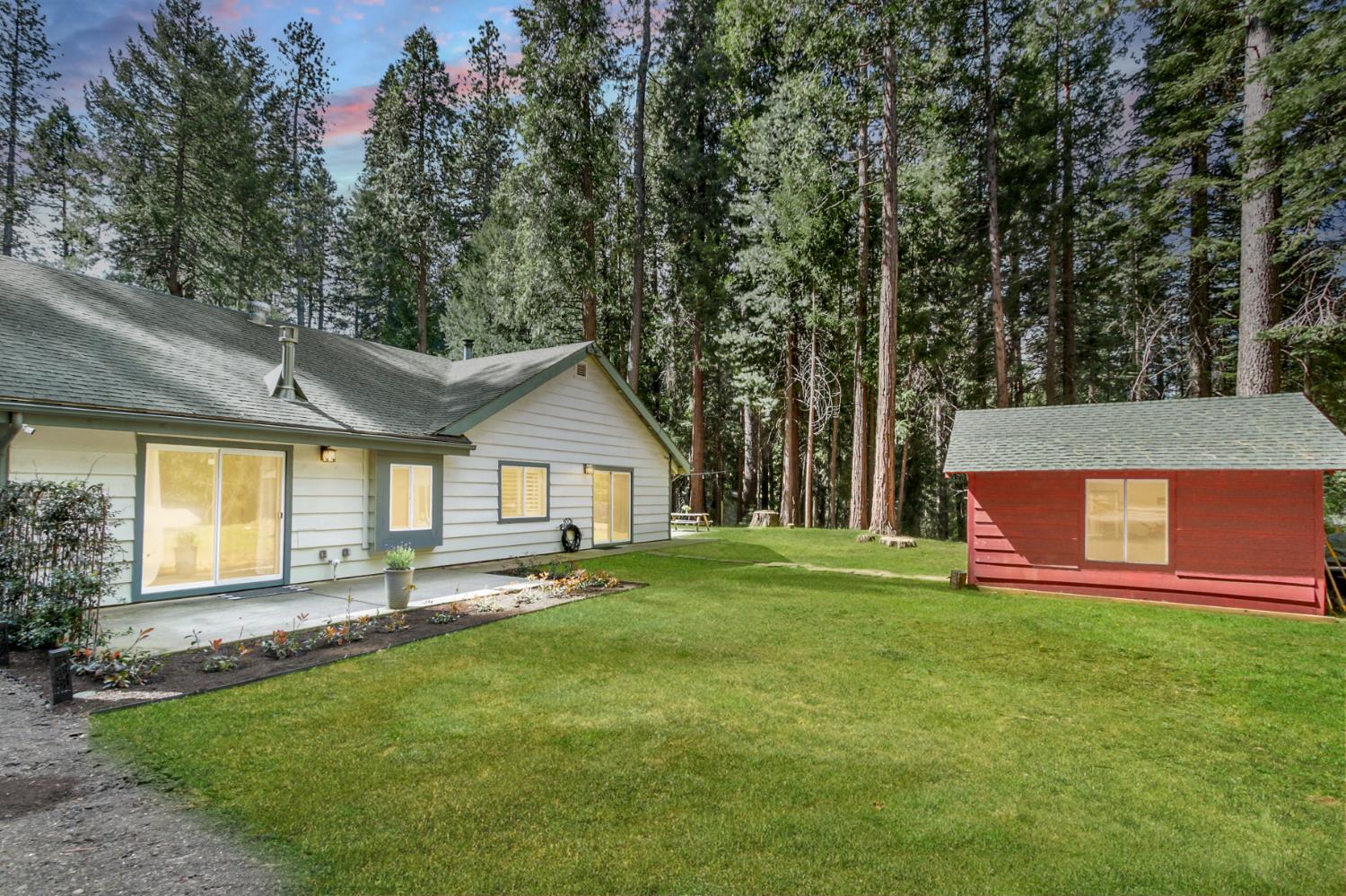 33837 Nary Red Road Alta, CA 95701 - Photo 5 of 74 a front view of a house with a garden