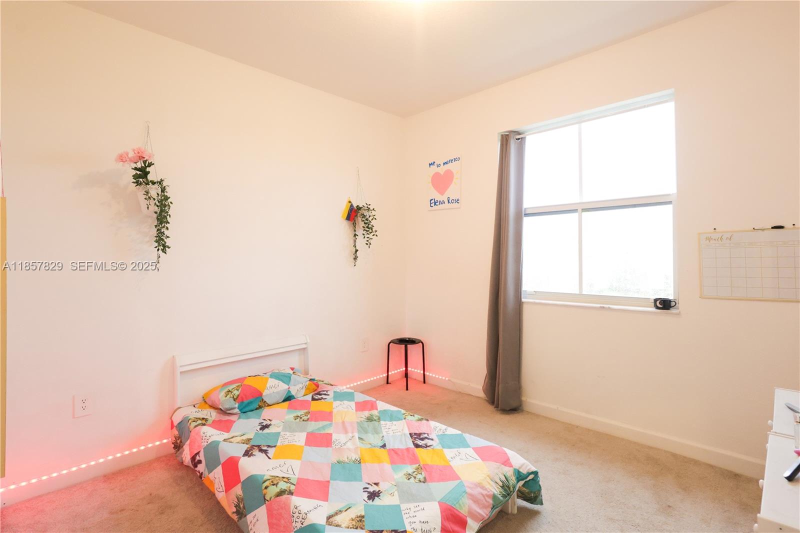14824 Southwest 265th Street Homestead, FL 33032 - Photo 17 of 17 a bedroom with a bed and a window