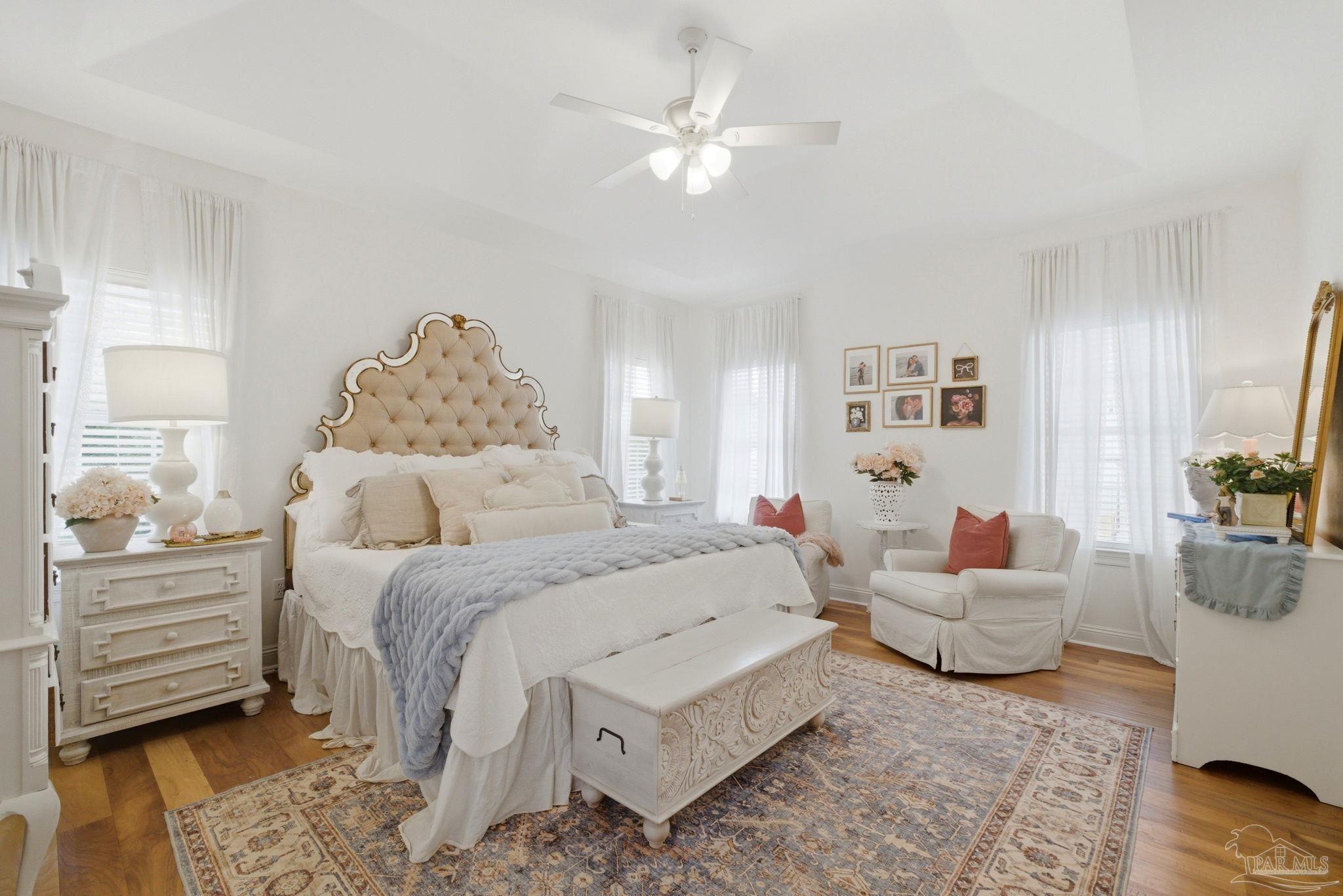 5931 Otter Point Road Pensacola, FL 32504 - Photo 35 of 67 a bedroom with a bed and ceiling fan