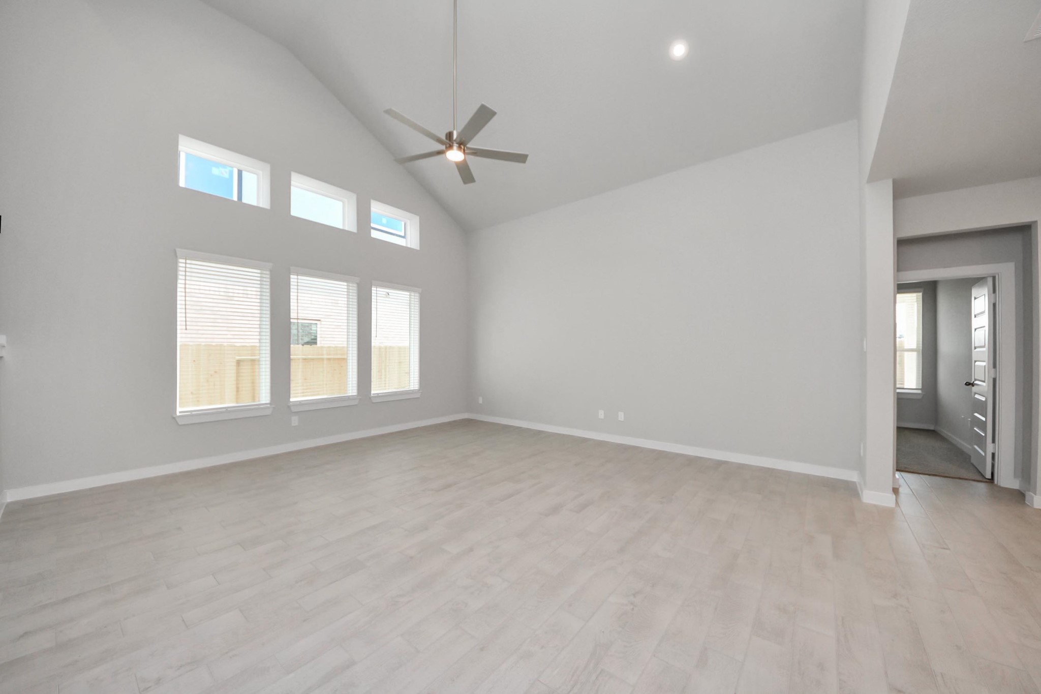 15715 Telge Ridge Lane Cypress, TX 77429 - Photo 18 of 48 wooden floor in an empty room with a window