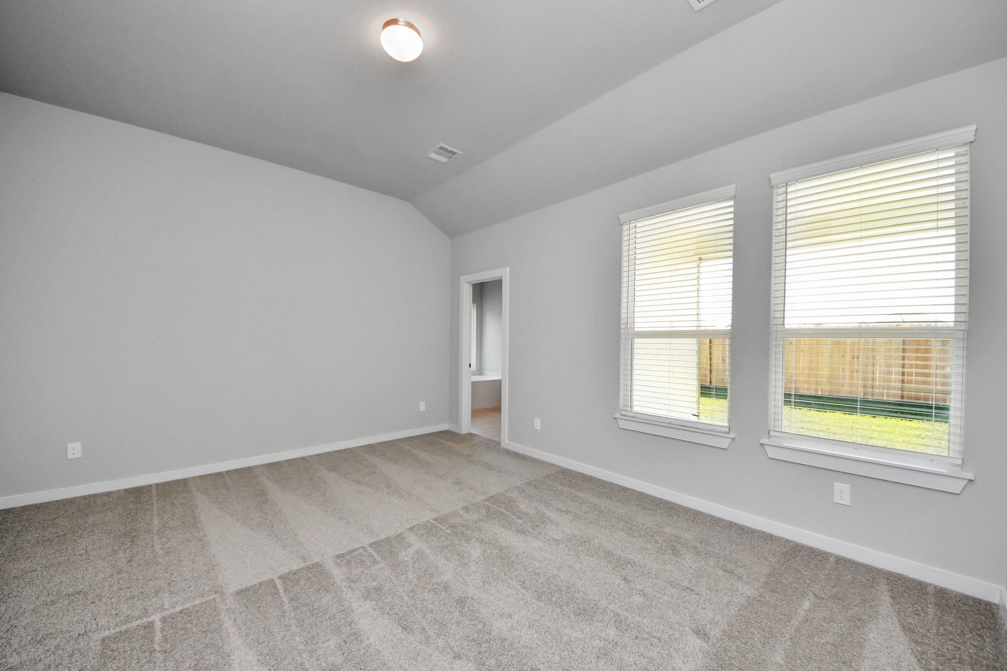 15715 Telge Ridge Lane Cypress, TX 77429 - Photo 25 of 48 an empty room with windows