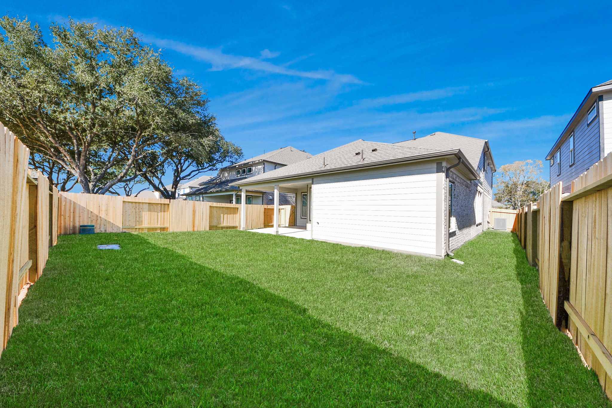 15715 Telge Ridge Lane Cypress, TX 77429 - Photo 43 of 48 a view of a house with a backyard