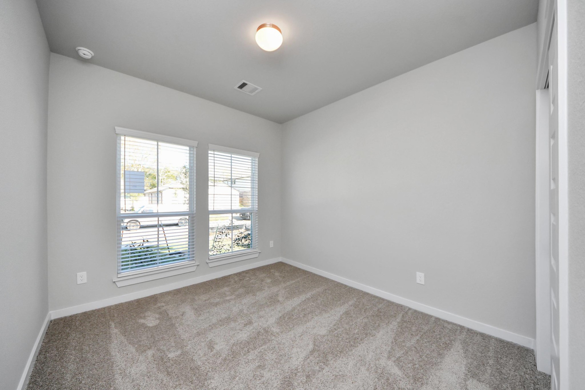 15715 Telge Ridge Lane Cypress, TX 77429 - Photo 7 of 48 an empty room with a window