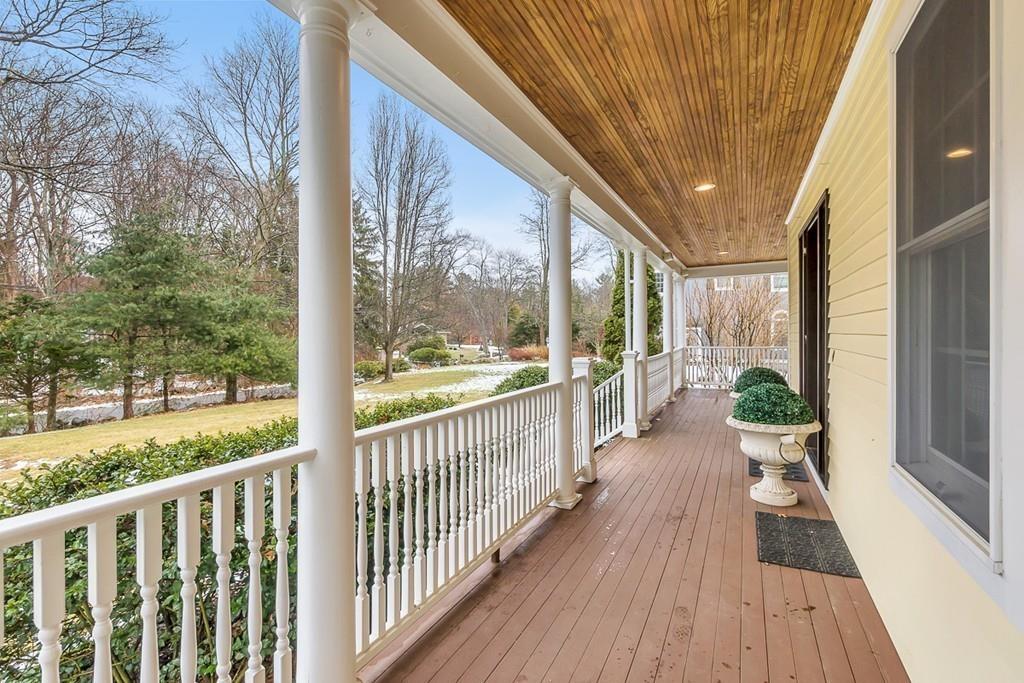 2 Sunset Rock Road Andover, MA 01810 - Photo 3 of 42 a view of a balcony with wooden floor