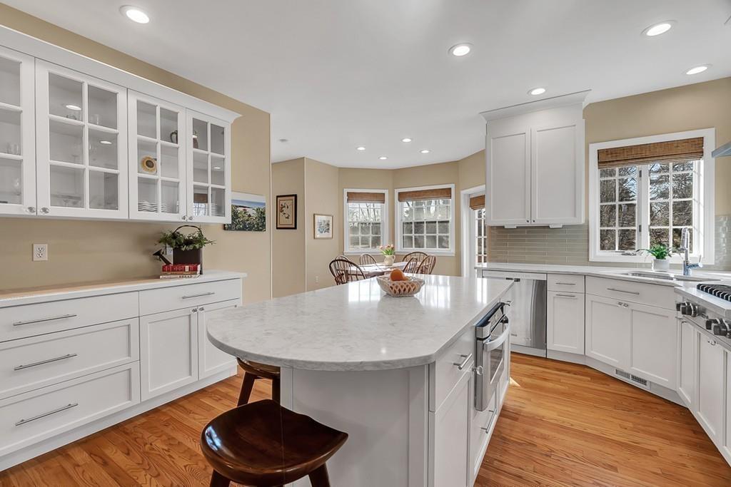 2 Sunset Rock Road Andover, MA 01810 - Photo 6 of 42 a kitchen with a sink stove and cabinets