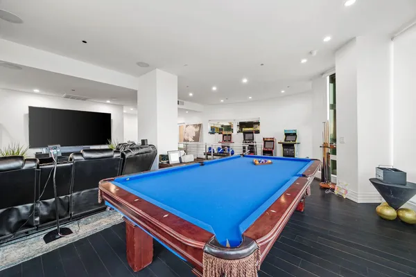 a living room with furniture and a table