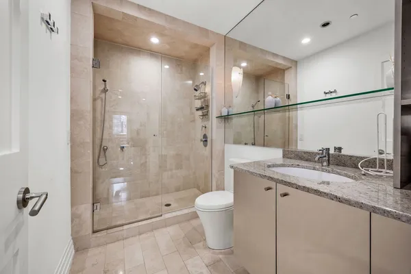 a utility room with sink dryer and washer