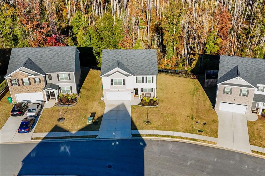 104 Waratah Drive Locust Grove, GA 30248 - Photo 24 of 27 an aerial view of a house with swimming pool