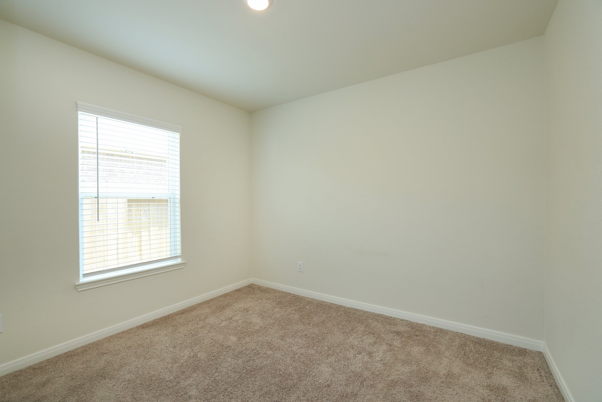 20914 Solstice Point Drive Hockley, TX 77447 - Photo 19 of 27 an empty room with a window