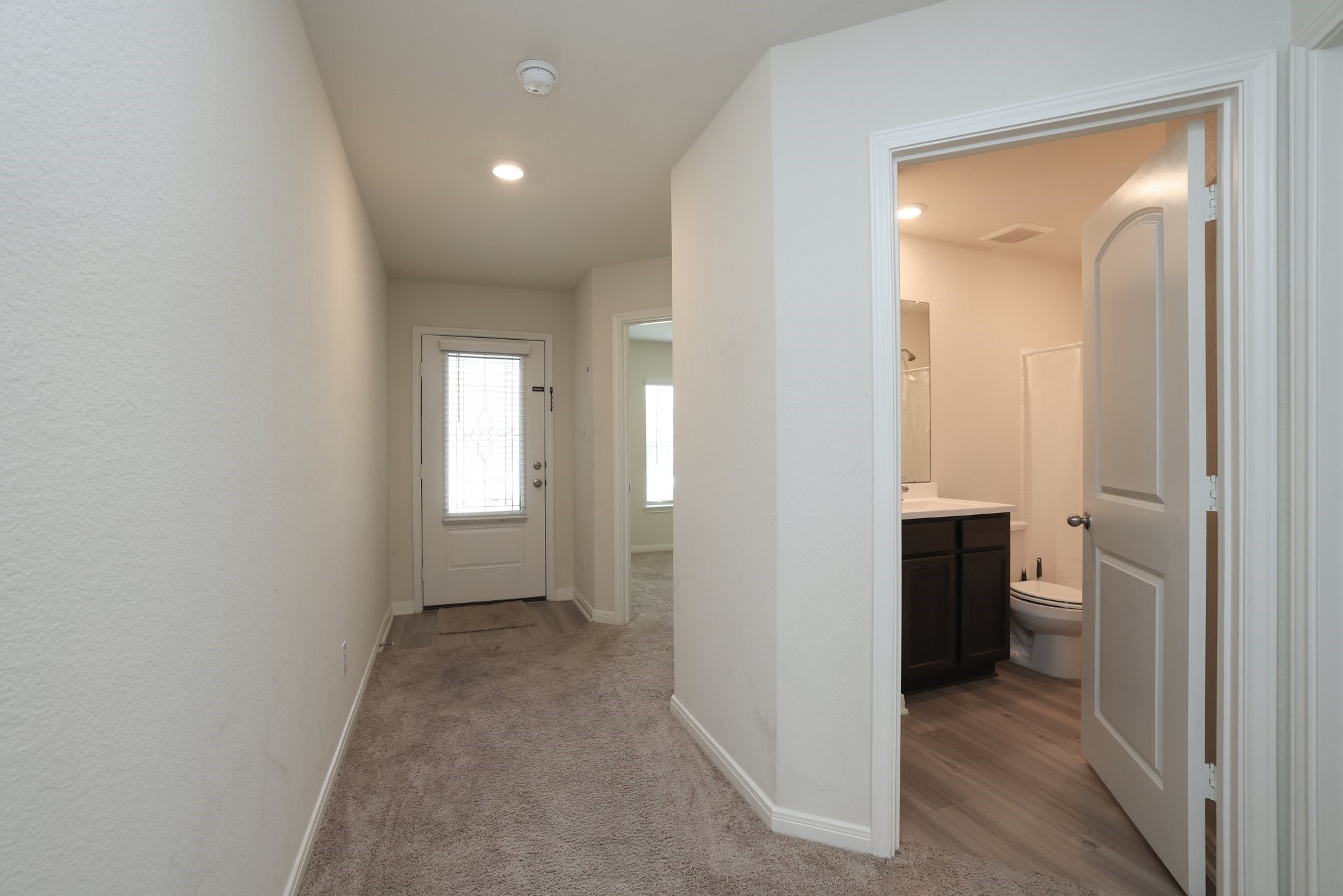 20914 Solstice Point Drive Hockley, TX 77447 - Photo 2 of 27 wooden floor in a en suite bathroom